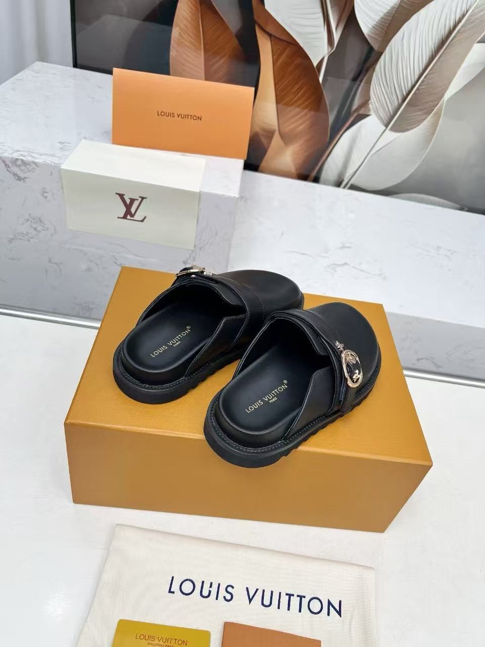 Black leather mule slippers