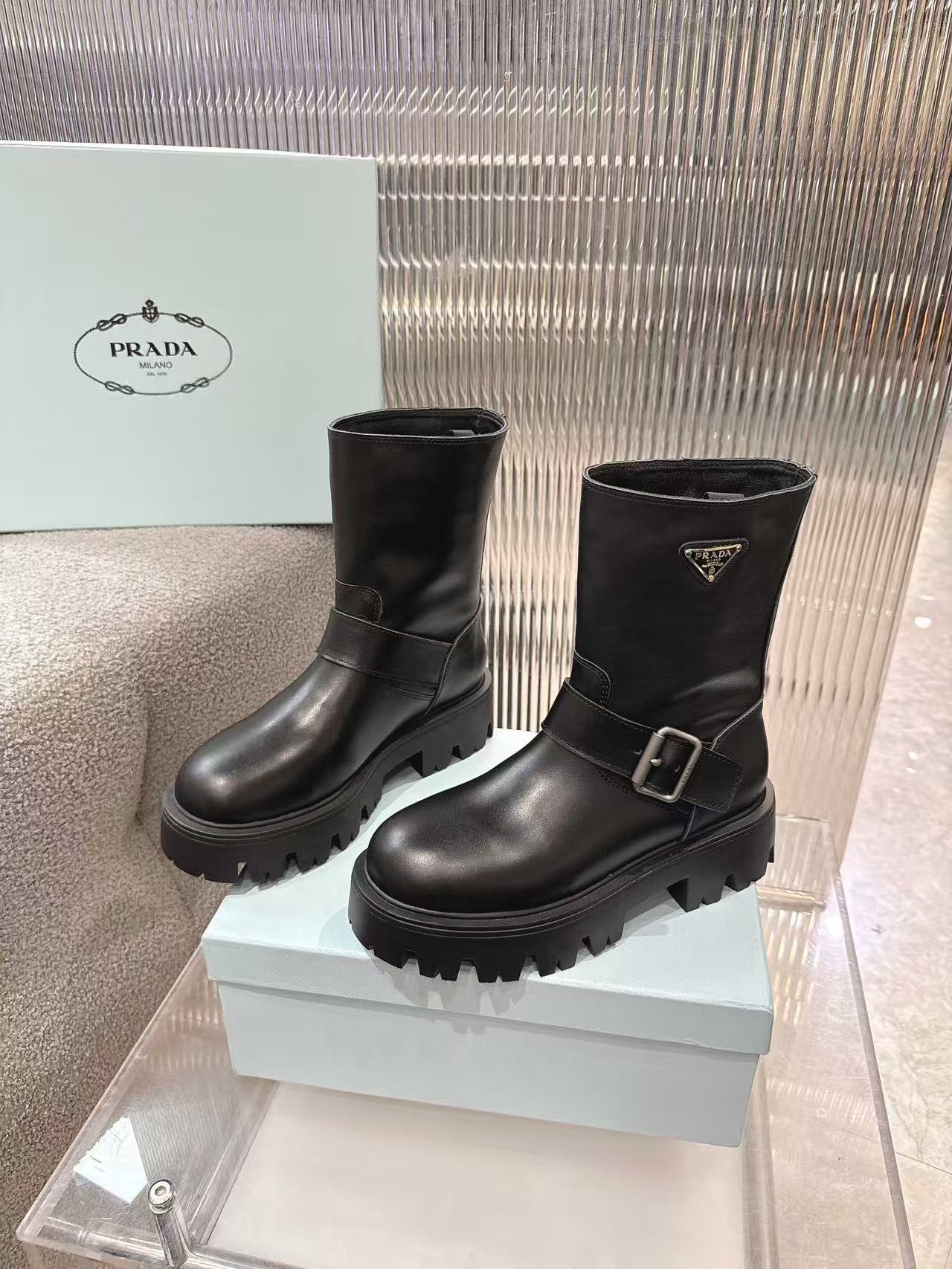 Buckled platform mid-calf boots