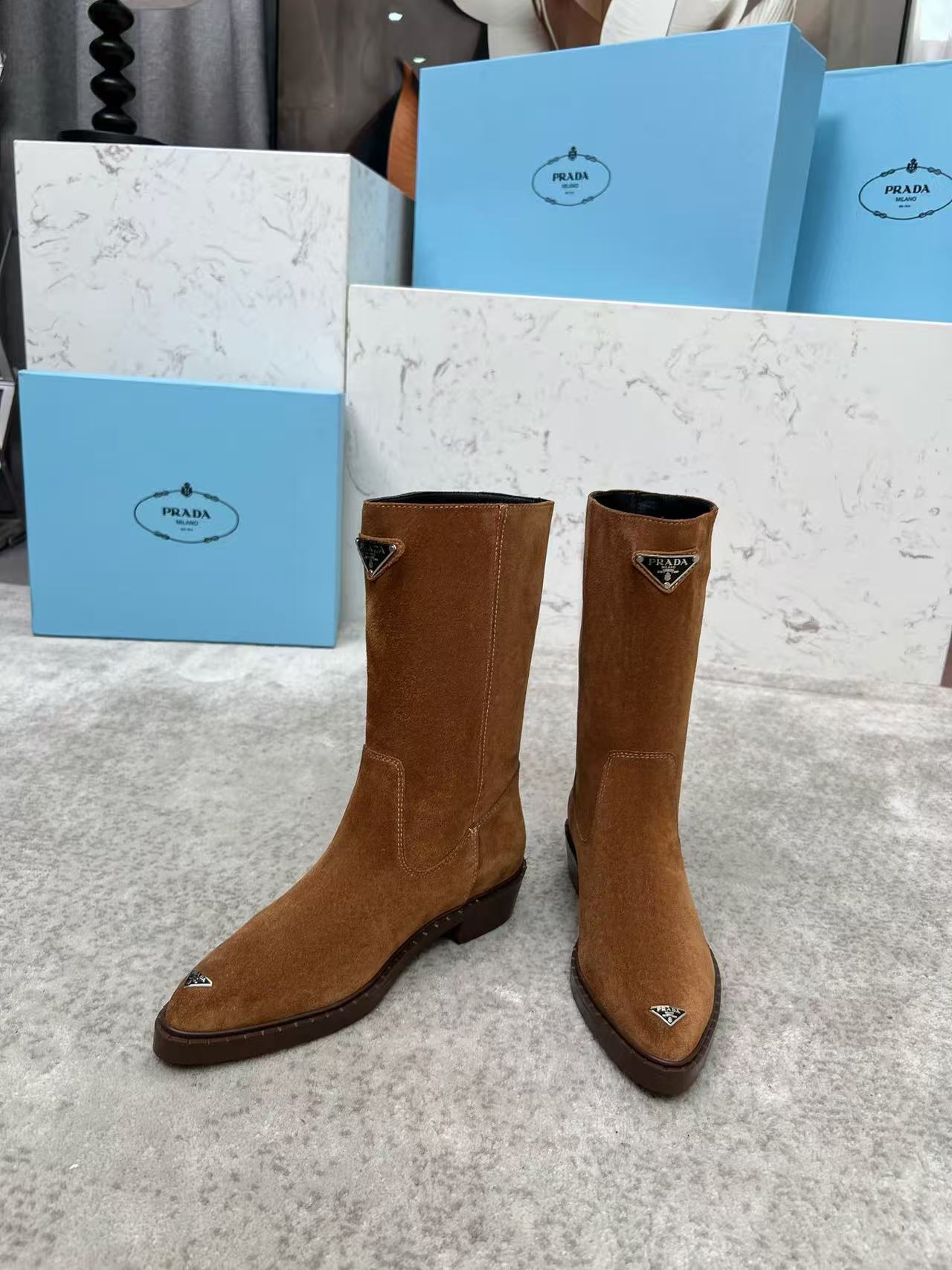 Brown suede mid-calf boots