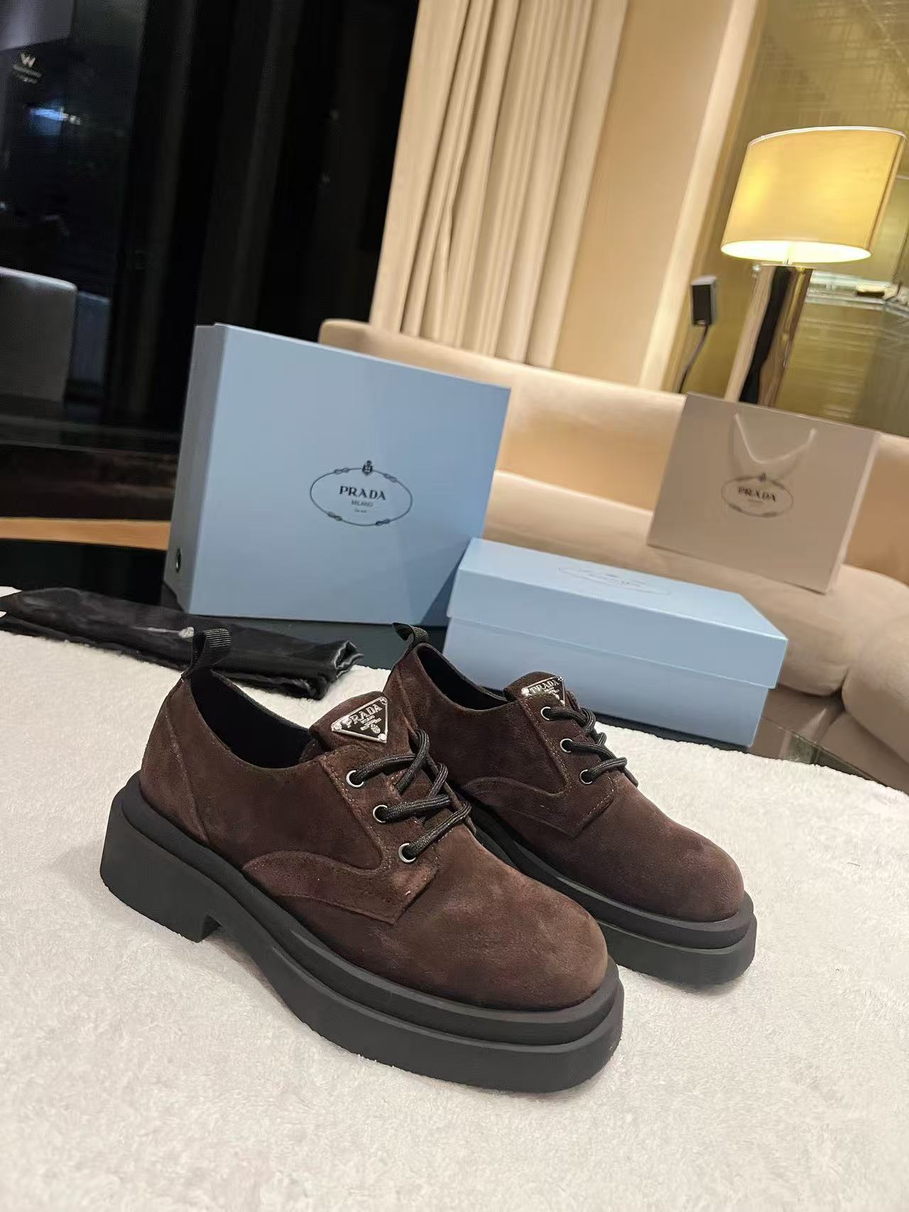 Brown suede platform lace-up sneakers