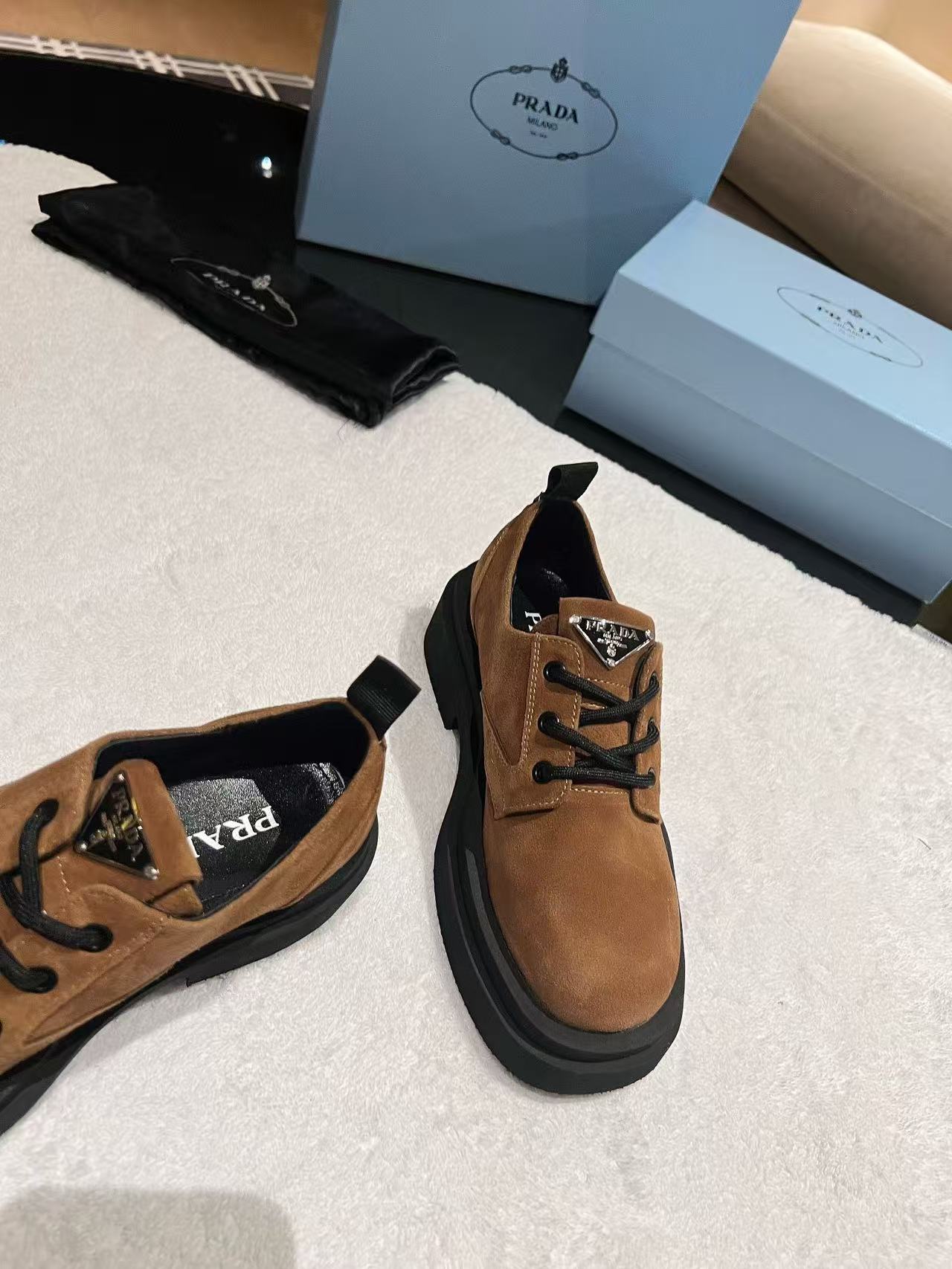 Brown suede platform lace-up sneakers