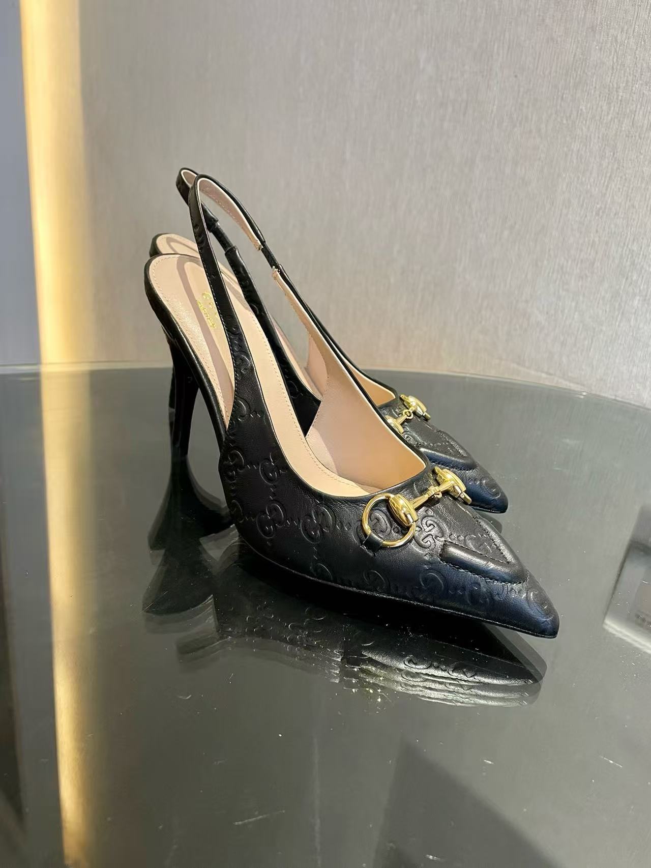 Horsebit pointed toe sandals