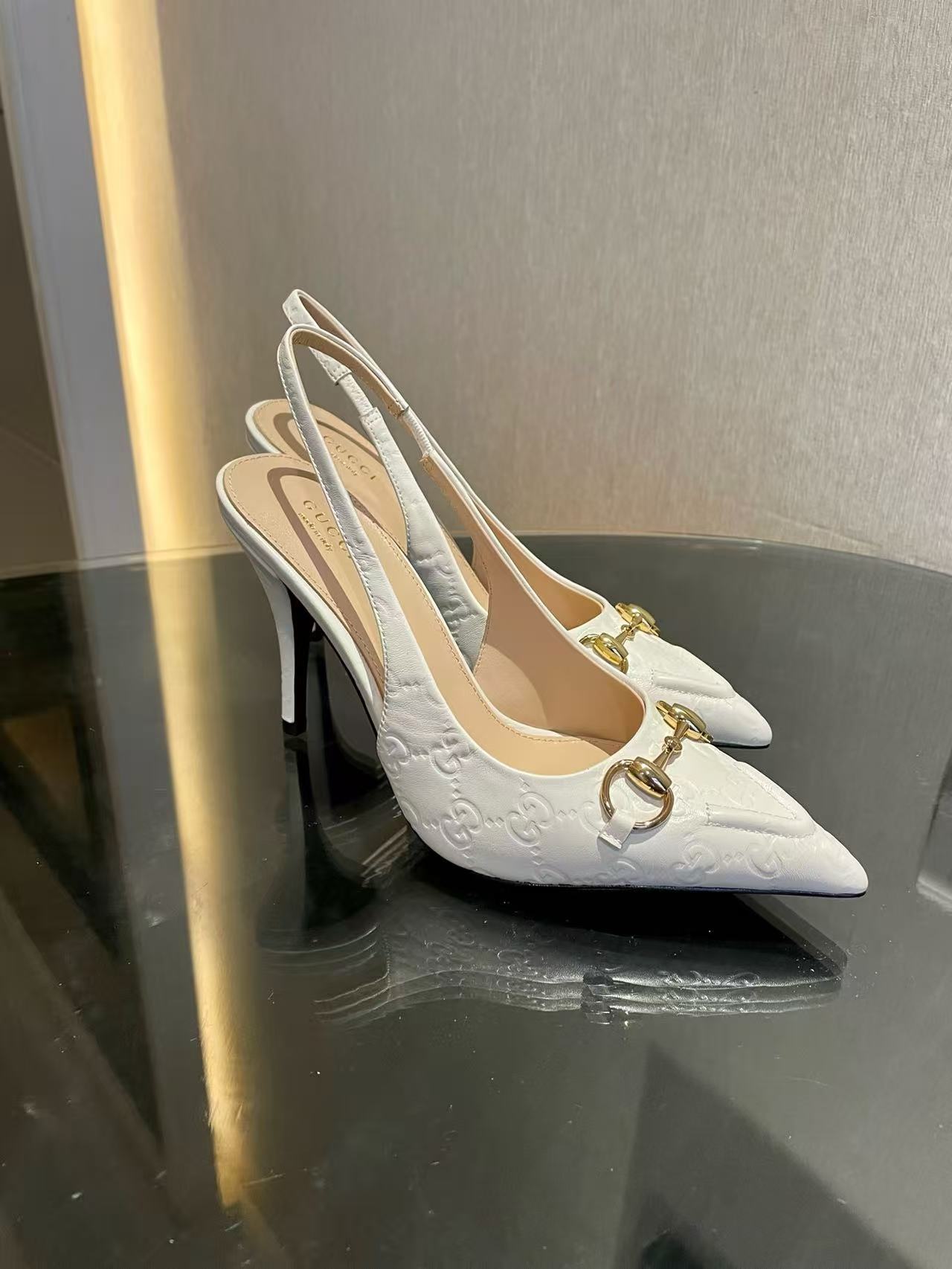 Horsebit pointed toe sandals