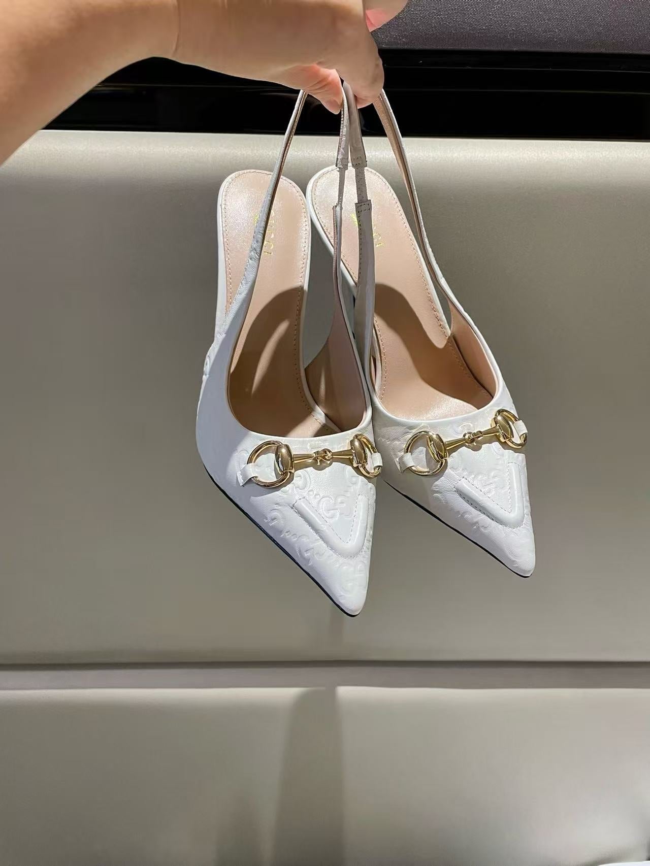 Horsebit pointed toe sandals