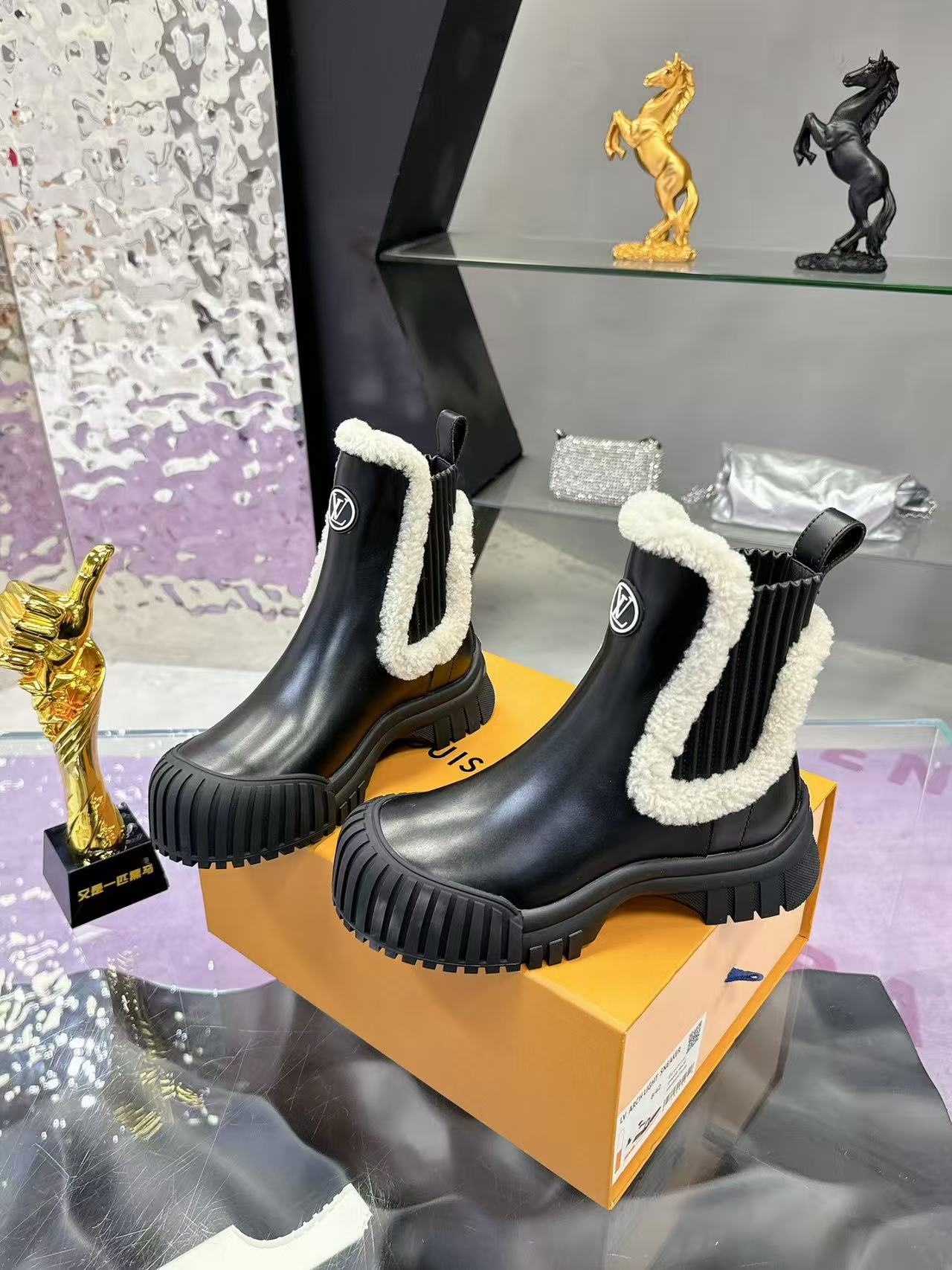 Plush-trimmed Chelsea ankle boots