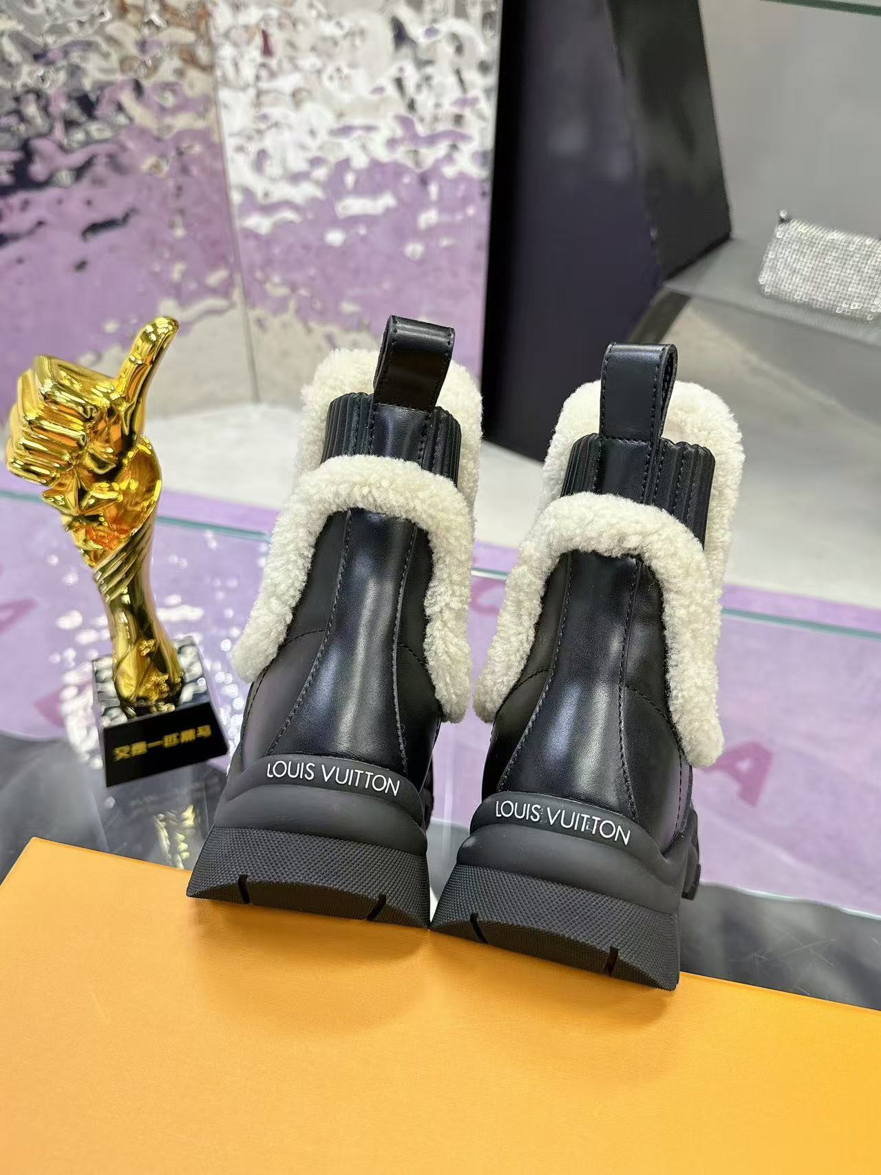 Plush-trimmed Chelsea ankle boots