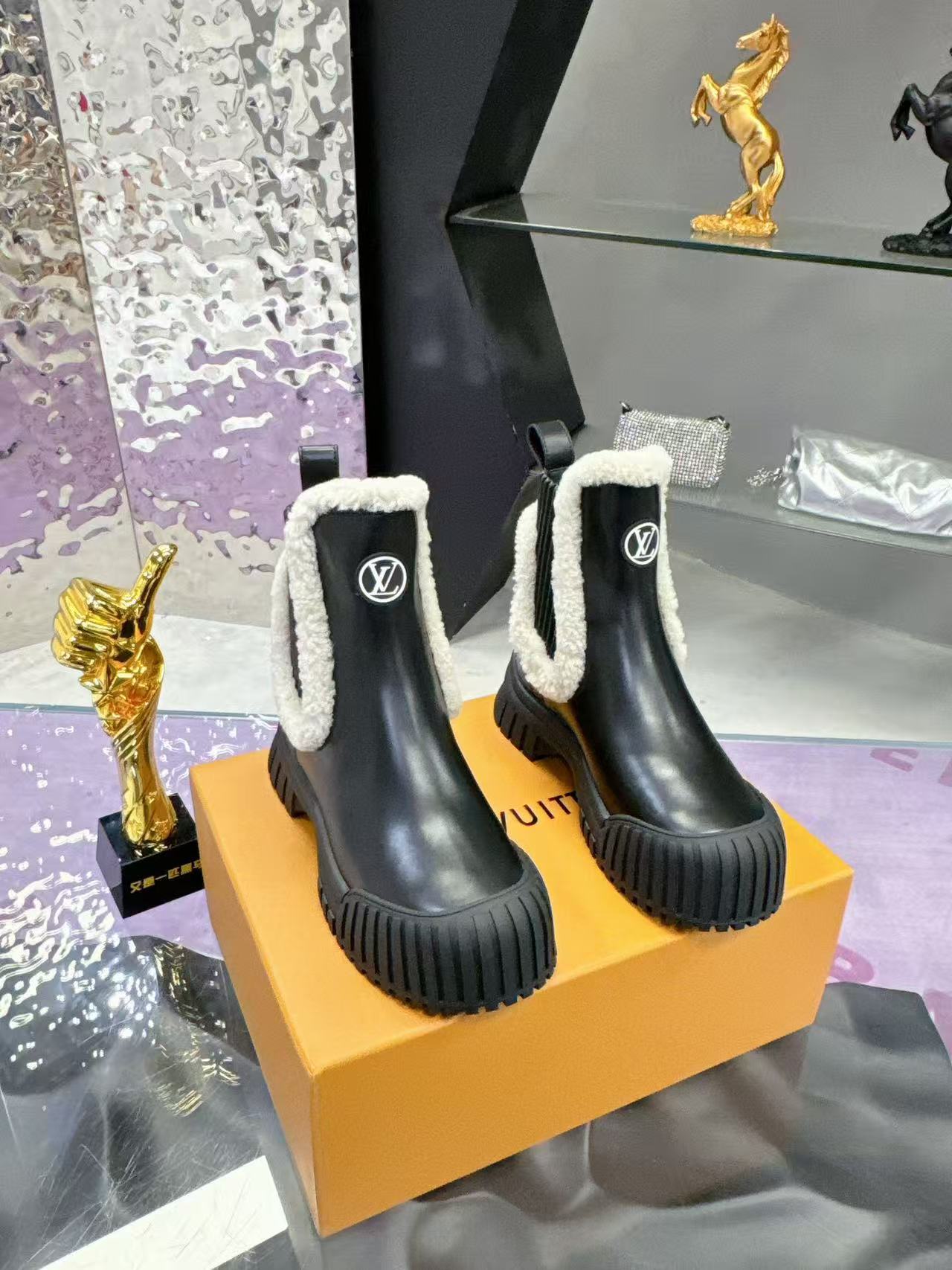 Plush-trimmed Chelsea ankle boots