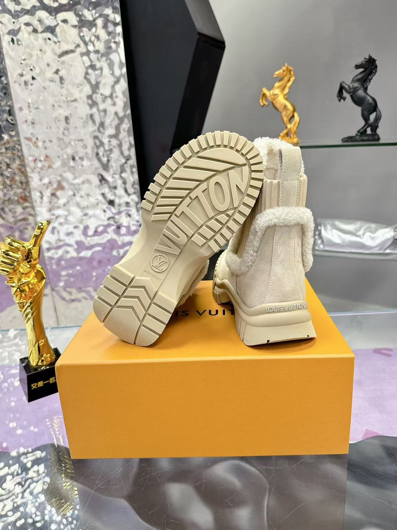 Plush-trimmed Chelsea ankle boots