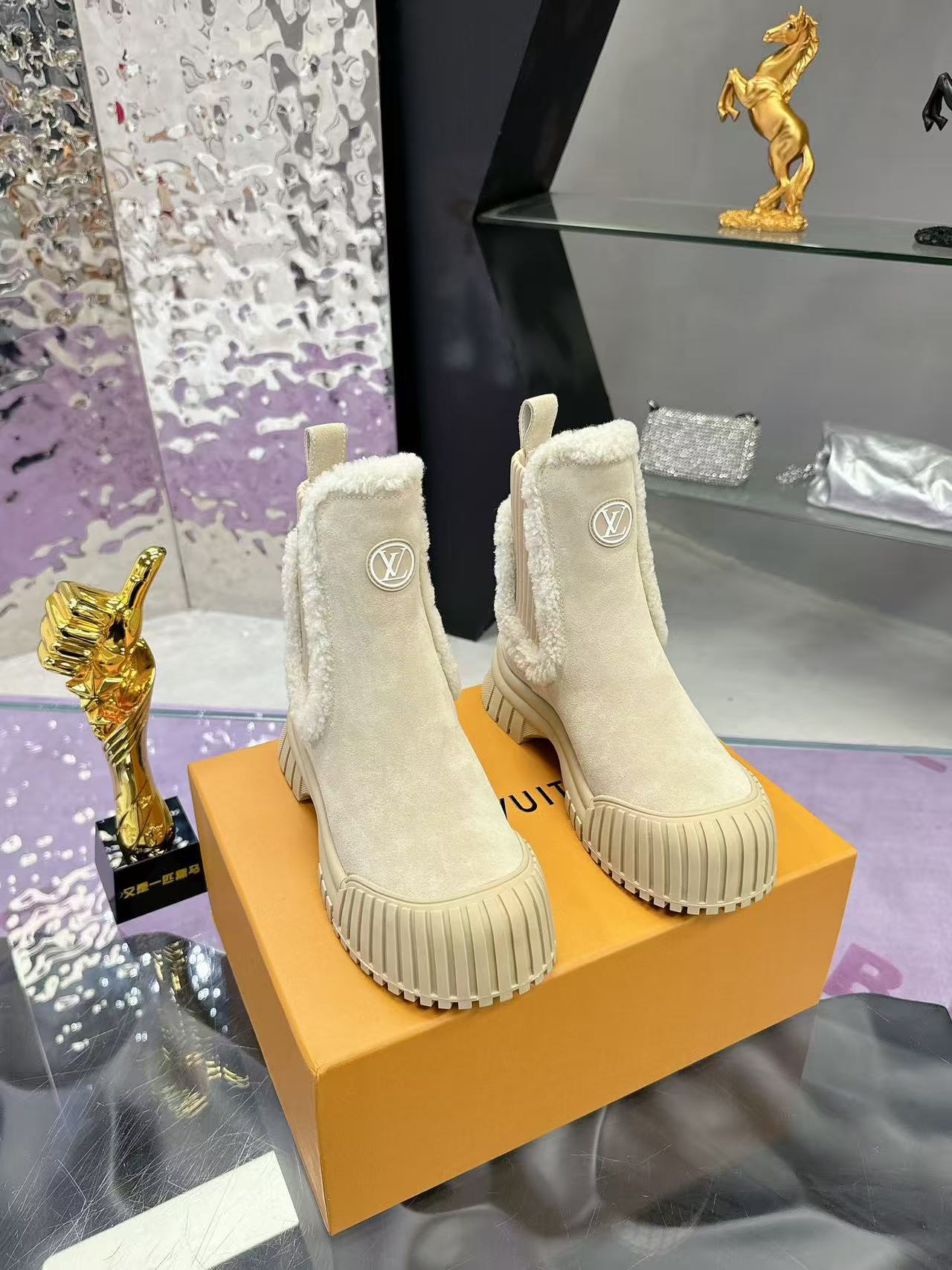 Plush-trimmed Chelsea ankle boots